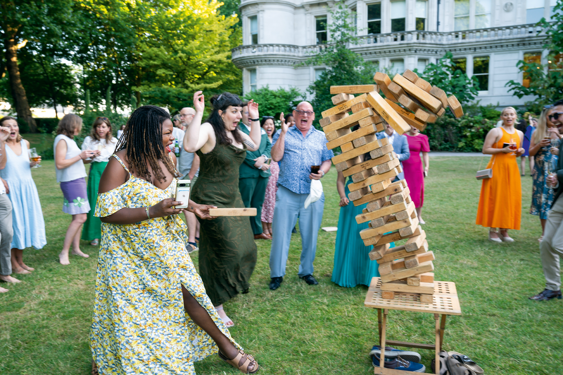 A tumbling tower of giant Jenga blocks 