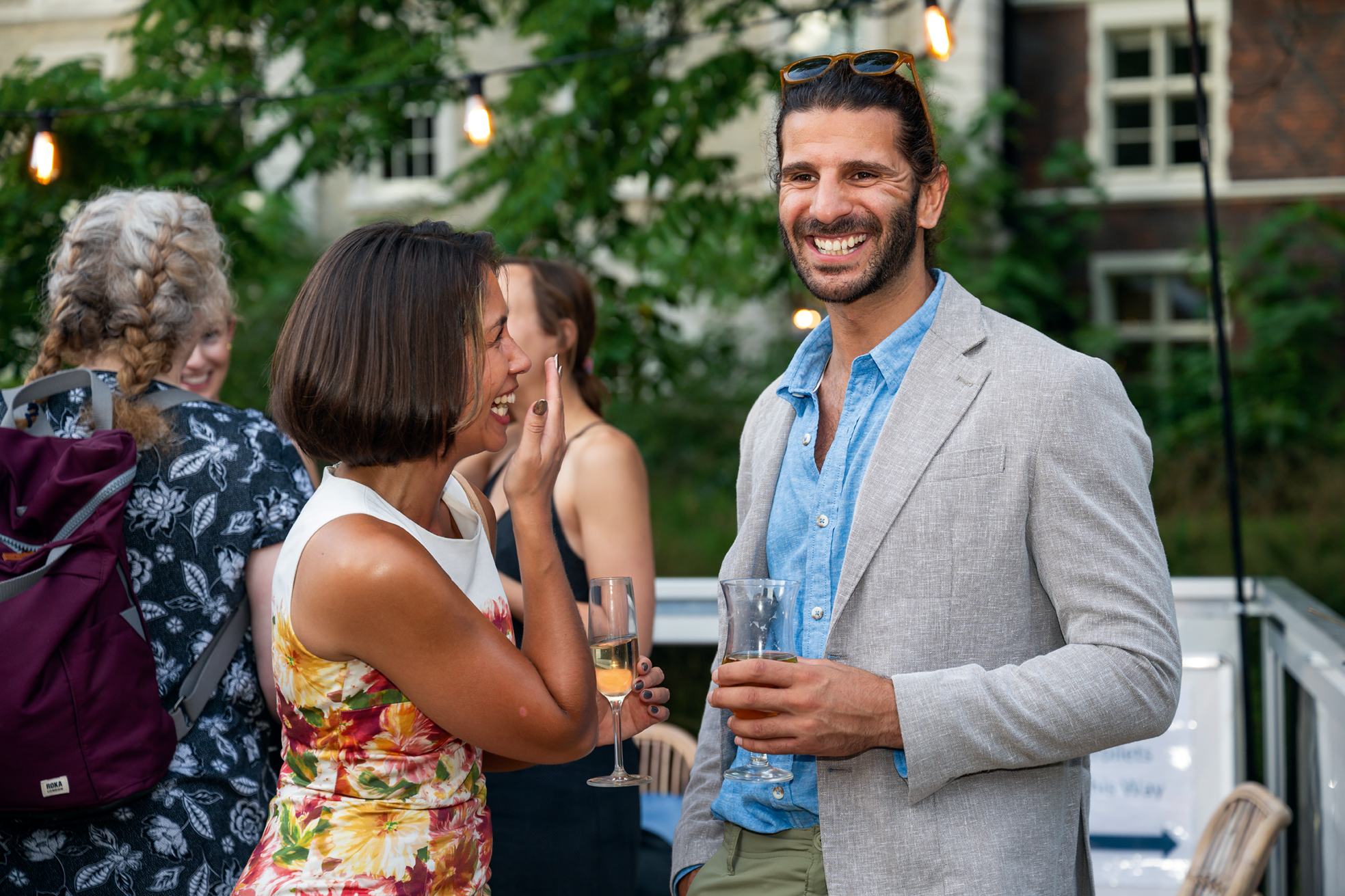 People laughing in a garden