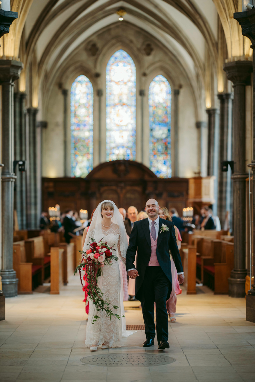 Bride and groom walking down the aisle