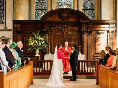 Bride and groom standing at the alter
