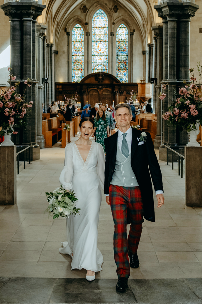 Bride and groom exiting the church