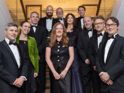 The Inn's newly appointed King's Counsel gathered on the Hall staircase before the Dinner for New Silks