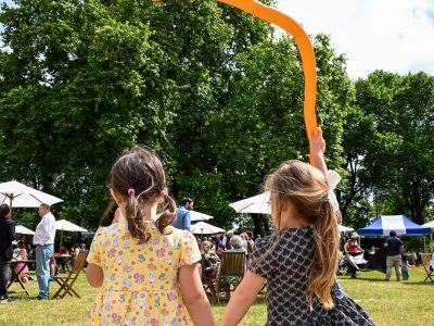 Children playing with balloons in the Inner Temple Garden at the Temple Big Picnic