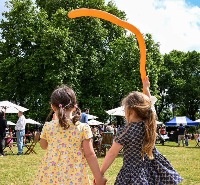 Children playing with balloons in the Inner Temple Garden at the Temple Big Picnic